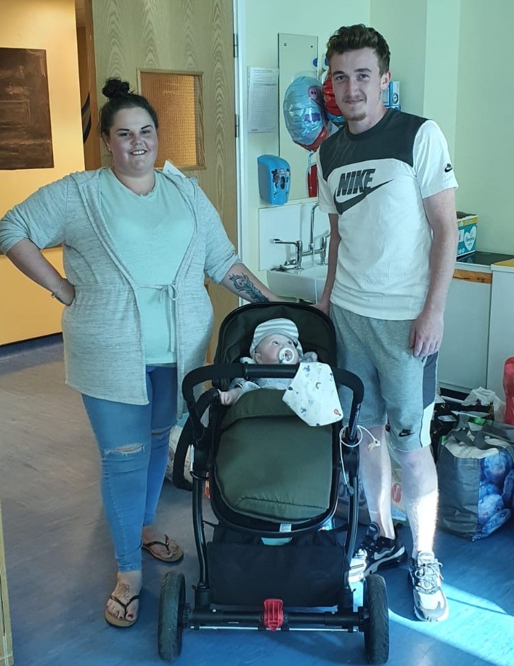 Baby Myles leaves hospital with his mum and dad