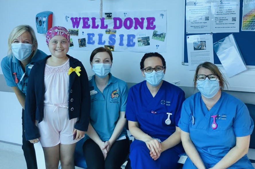 cancer patient Elsie with play speciaists at the Noah's Ark Children's Hospital for Wales 